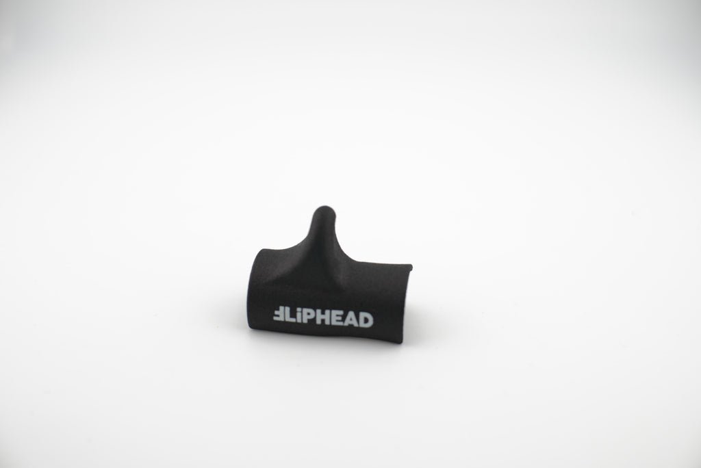 Flute thumb rest fliphead
