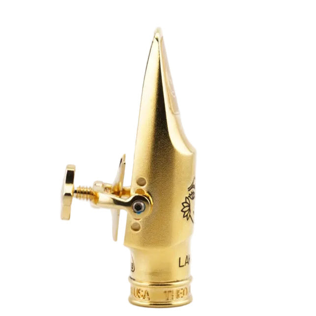 Gold mouthpiece with 'Theo Wanne' branding on a white background