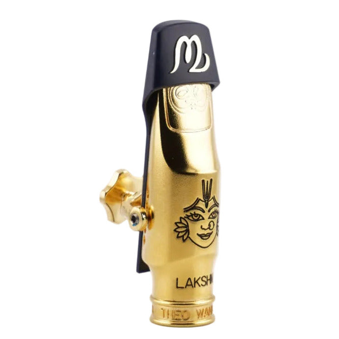 Gold mouthpiece with 'Theo Wanne' branding on a white background