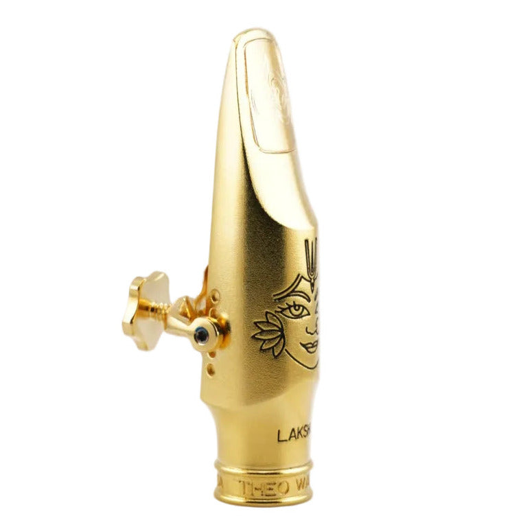 Gold mouthpiece with 'Theo Wanne' branding on a white background