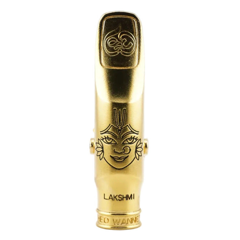 Gold mouthpiece with 'Theo Wanne' branding on a white background