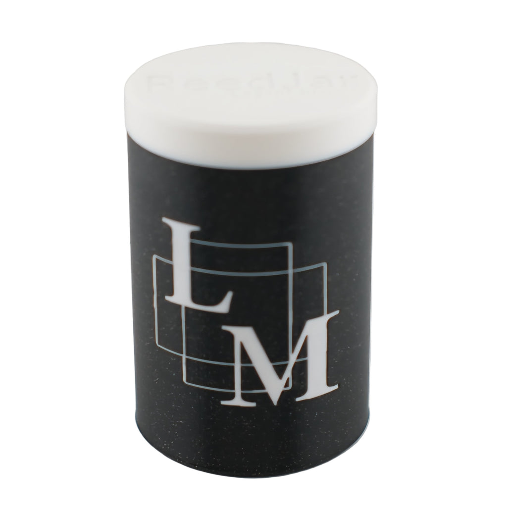 Three humidified reeds jars with white lids on a white background, jar of 13+